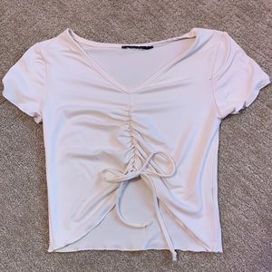 TJ Maxx, yellowish shirt